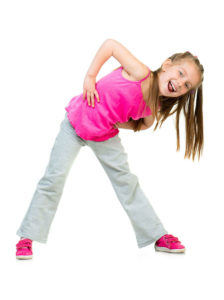 a girl stecthing or doing a pose