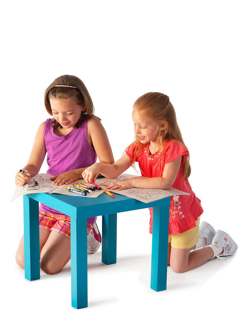 girls coloring with crayons