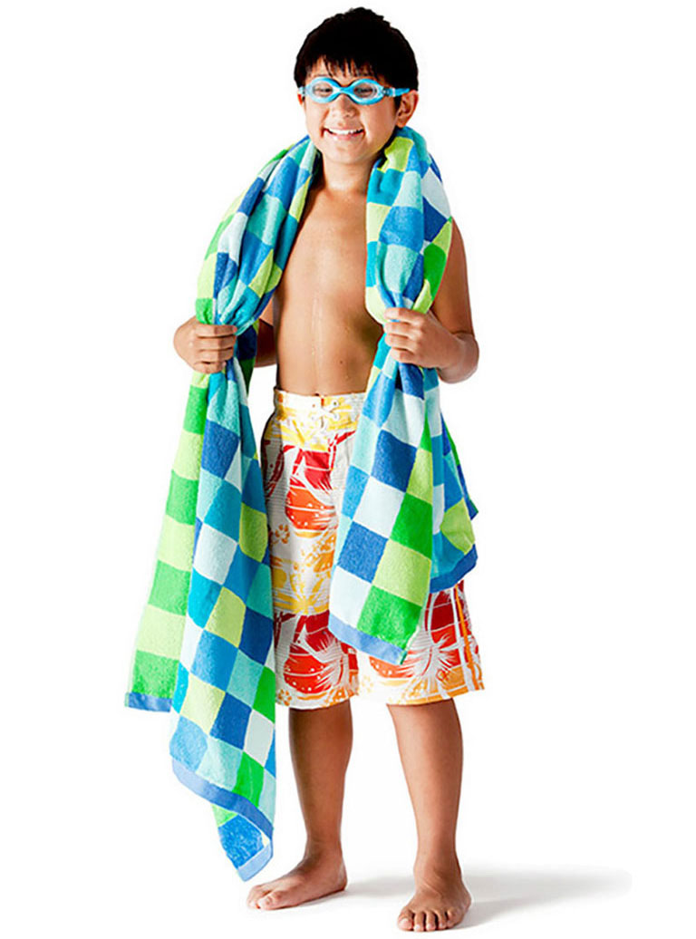 a boy with a swimsuit and towel