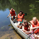 children going canoeing