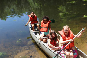 children going canoeing