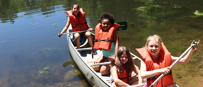 children going canoeing