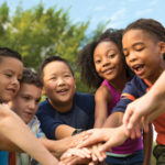 group of diverse kids at summer camp