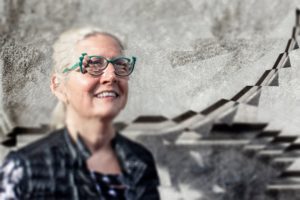 abstract image of woman wearing blue glasses