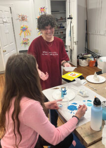 Susan Howland teaching an arts class at the Y Arts Center